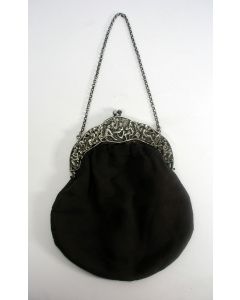 Zilveren beugeltas, 1928