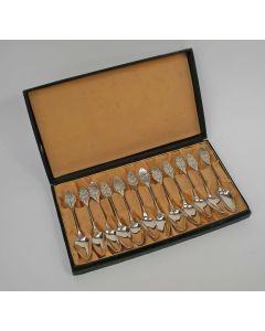 12 zilveren theelepels, bladsteel, ca. 1920