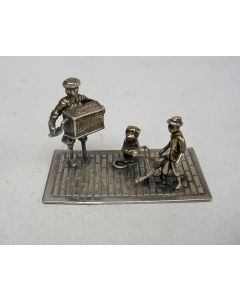 Zilveren miniatuur, orgelman