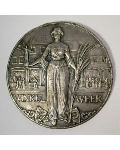 Zilveren penning, Winkelweek, aangeboden door W.H. de Beaufort