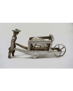 Miniatuur zilveren slager met varkens, Sneek, 19e eeuw