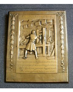 Bronzen plaquette, 'De  boekdrukker', J.C. Wienecke, ca. 1930