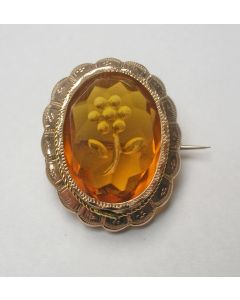 Gouden broche met gegraveerde citrien
